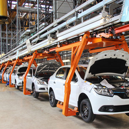 white SUVs in automotive factory
